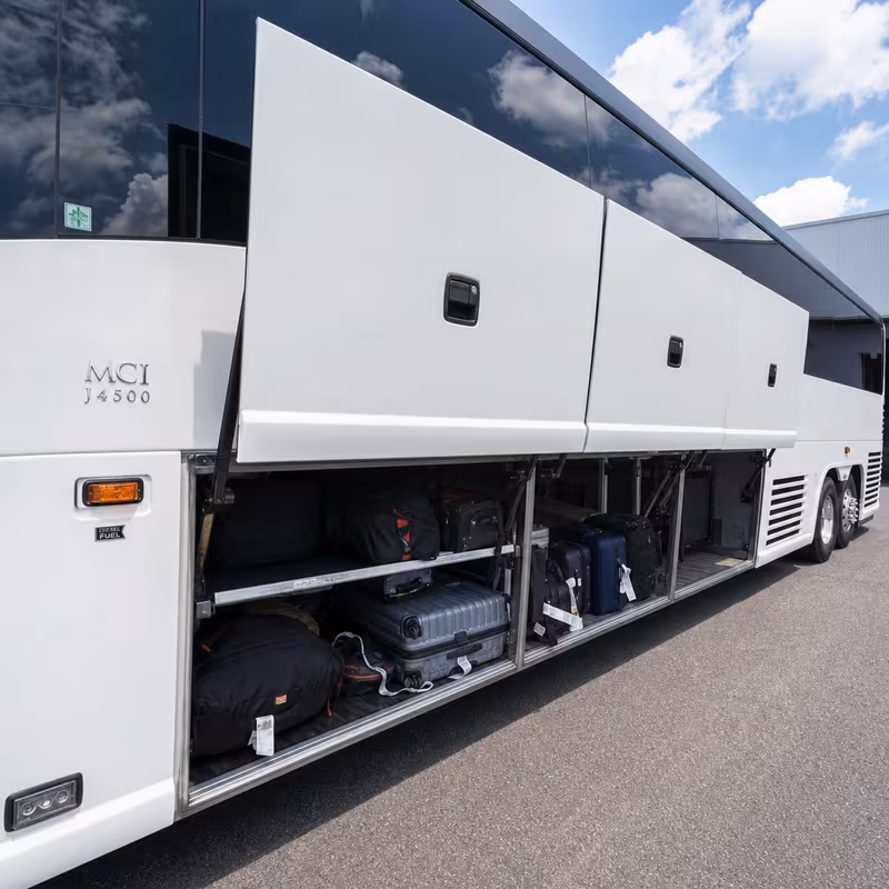 Party bus interior with wraparound leather seating and LED lighting in Delray Beach