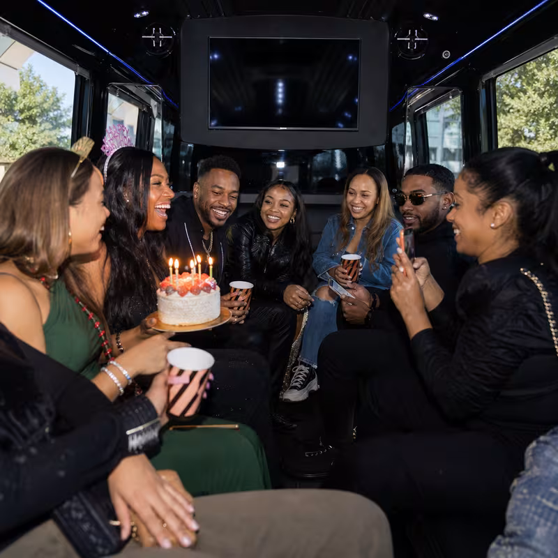 Black Mercedes Sprinter van staged for an Delray Beach Birthday Transportation group