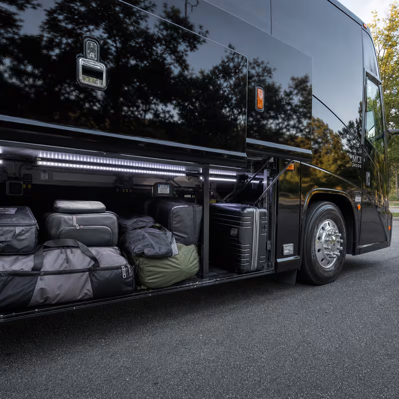 Party bus interior with wraparound leather seating and LED lighting in Delray Beach