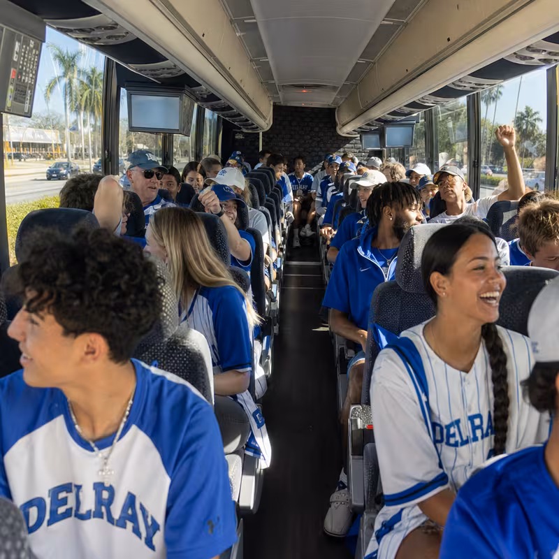 Black Mercedes Sprinter van staged for an Delray Beach Sporting Event Transportation group